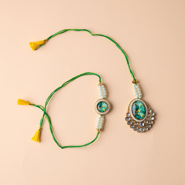 Sharvani-Shakti Couple Rakhi Set
