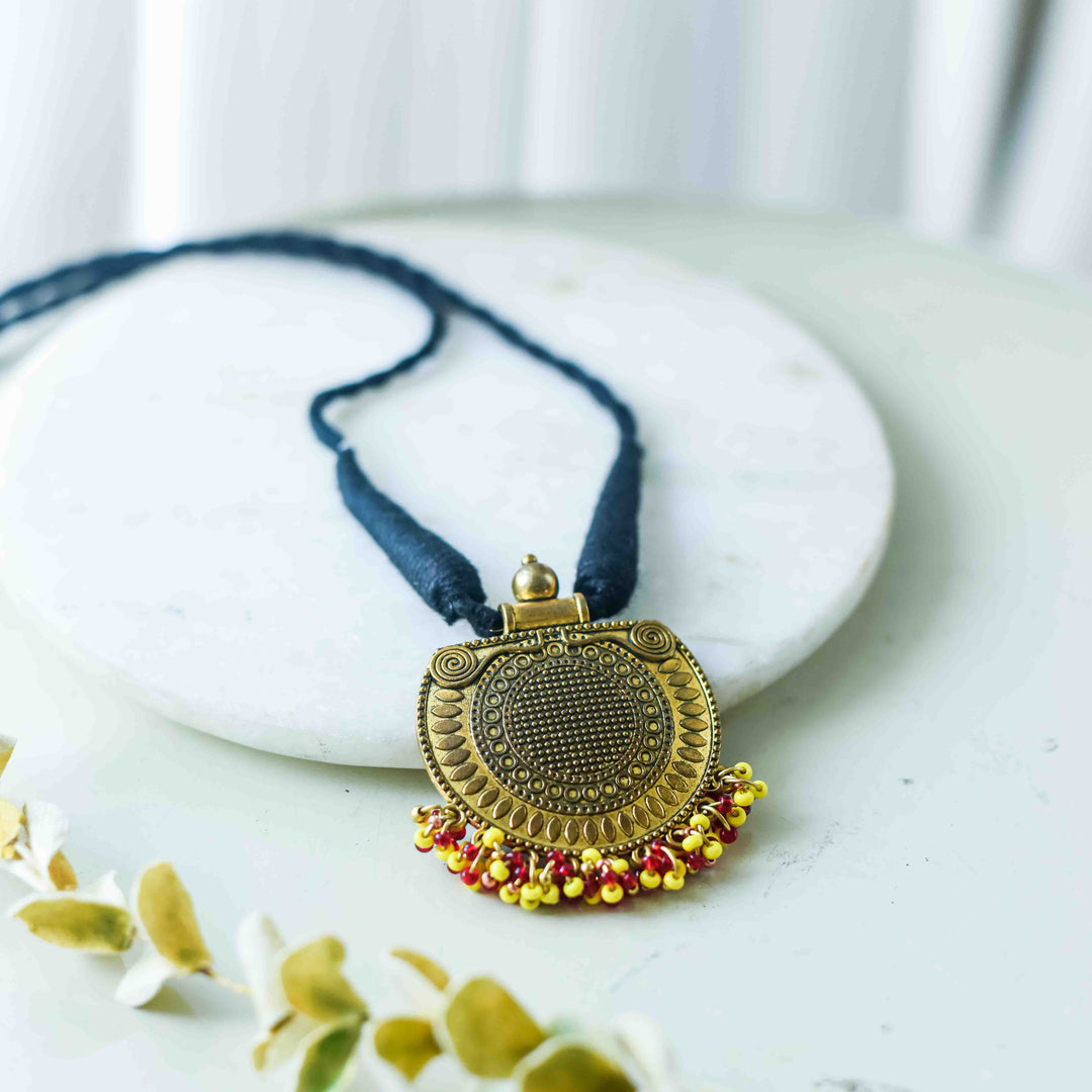 Mihir Metal Pendant Necklace